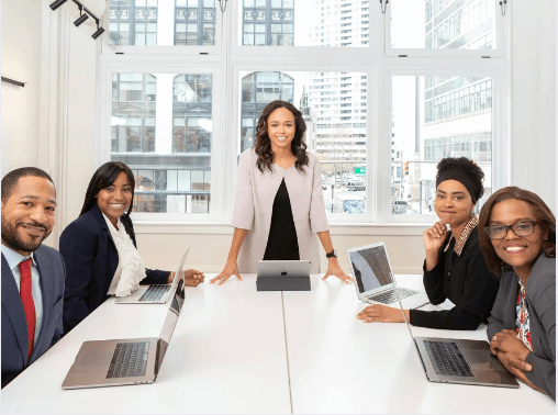 Diverse professionals collaborating in a strategy meeting